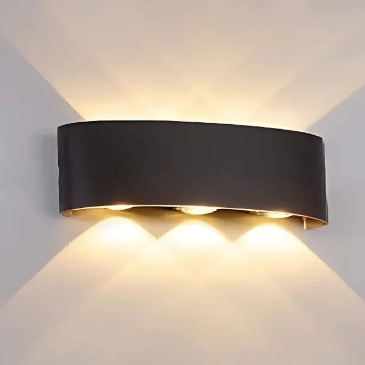 Modern black wall sconce with warm up and down lighting for contemporary interior decor